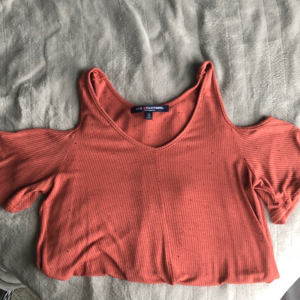 Burnt orange “cold shoulder” top